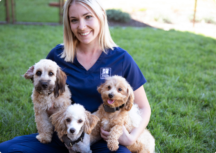 A woman with puppies